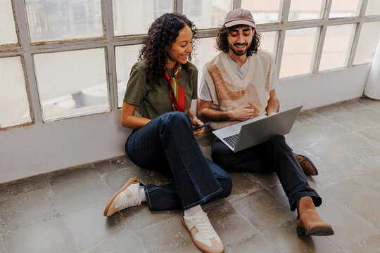 Professionals working together in modern office space