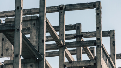 abstract background fragment of a building from concrete blocks on a light background