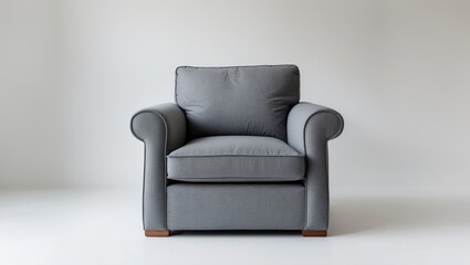 Gray armchair positioned centrally against a plain white background with a minimalist style highlighting its clean lines and cozy appearance.