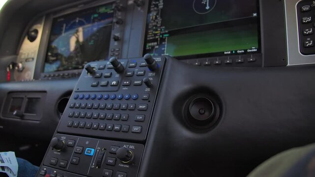 Close Up Instrument Panel Buttons - Avionics Suite of Private Airplane