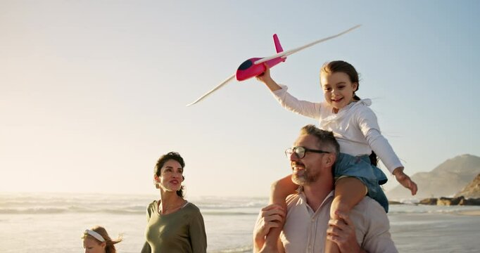 Parents, children and toy plane at beach, happy and playful with bonding, summer and mockup space in sky. People, mom and dad with kids, games and fun with flight, airplane and holiday in Australia