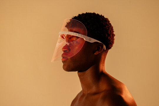 Man Wearing Futuristic LED Face Shield