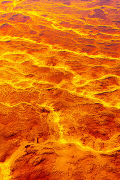 Fiery textures in abstract mineral landscape