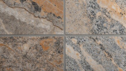 Granite stone tiles featuring a matte finish with earthy tones of gray and orange, arranged in a square layout with visible grout lines.