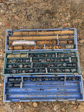 Mineral Core Samples in Storage Trays on Geological Exploration Site