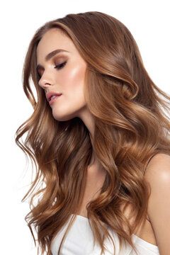 A profile shot of a woman with long, flowing hair and subtle makeup, conveying elegance and beauty against a dark background.
