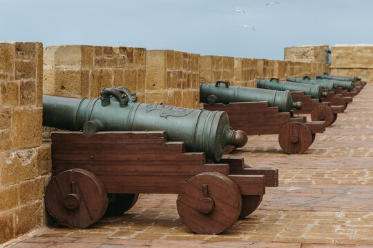 Ancient cannons along Essaouira fortress walls  
