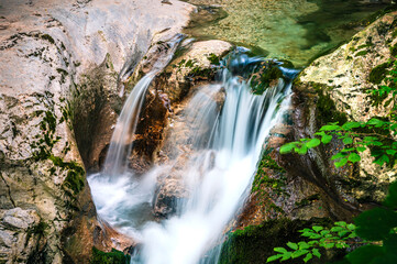 Immersion in the greenery. Kobarid natural waterfalls of Kozjak. Wonder of nature