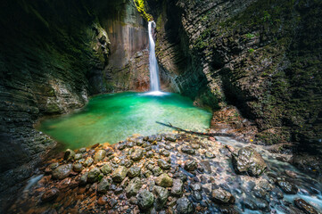 Immersion in the greenery. Kobarid natural waterfalls of Kozjak. Wonder of nature