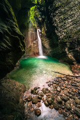 Immersion in the greenery. Kobarid natural waterfalls of Kozjak. Wonder of nature