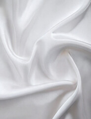 Obraz premium Shiny white fabric background with soft wrinkles