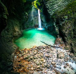 Immersion in the greenery. Kobarid natural waterfalls of Kozjak. Wonder of nature