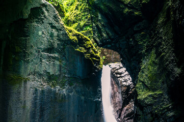 Immersion in the greenery. Kobarid natural waterfalls of Kozjak. Wonder of nature