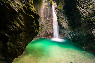 Immersion in the greenery. Kobarid natural waterfalls of Kozjak. Wonder of nature