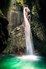 Immersion in the greenery. Kobarid natural waterfalls of Kozjak. Wonder of nature