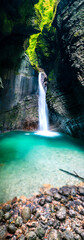 Immersion in the greenery. Kobarid natural waterfalls of Kozjak. Wonder of nature