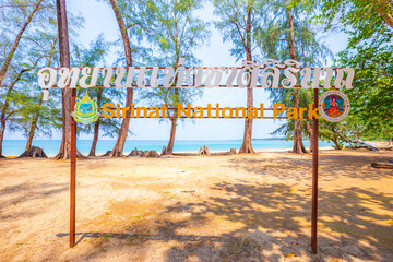 Sign label of "Sirinat National Park" on the beach of Sirinat National Park, Phuket Thailand, Asia. Travel destination of Phuket.