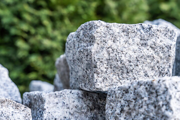 Granite cobblestones stacked for paving