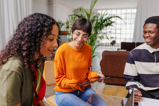 Creative team engaging in collaborative discussion at office