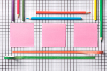 Colorful Stationery and Grid Pattern With Pink Sticky Notes
