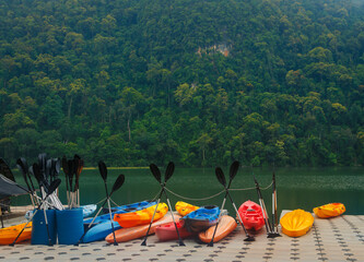 Kayaks in the blue lagoon ocean sea in Malaysia waiting the tourists.