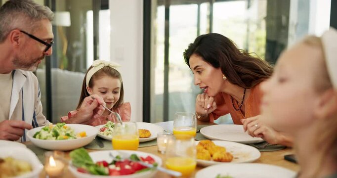 Father, mother and talk to girl, lunch and eating vegetables with care, bonding and happy in family home. People, mom and dad with children, food and nutrition with diet, meal and Easter at house
