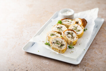 Homemade omelette roulade with chicken