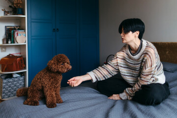 Engaging Moment Between a Woman and Her Dog