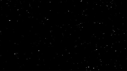 White Snow Falling on Isolated Black Background, Shot of Flying Snowflakes Bokeh, Dust Particles or Powder in the Air. Holiday Overlay Effect