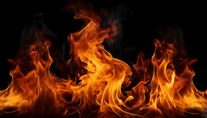Fototapeta premium bright orange and yellow flames flicker against a deep black background highlighting the violent beauty of the fire