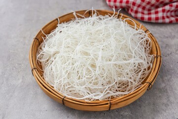 Glass Noodles in white plate on gray background, thai called wun sen   © Meowwelove
