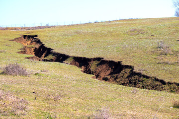 Fault line. Earthquake. Fault line visible from the surface. Ground motion.	
