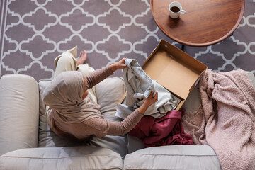 Woman checking online order package