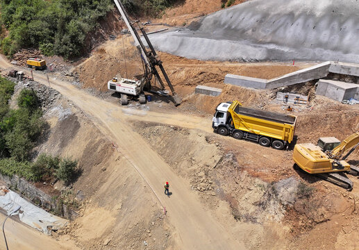 Aerial View of a Large Construction Site with Equipment and Vehicles