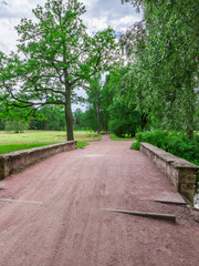 Dirt road with a bridge over it