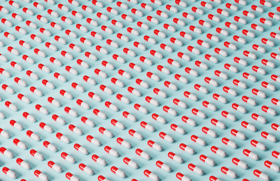 Pills in rows on a light blue background.