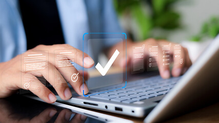 Businessman tick mark an assessment, online survey online exam choose the right answer in the exam,...