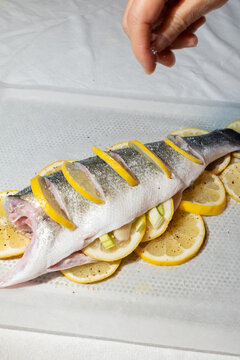 Seasoning Whole Sea Bass with Lemon