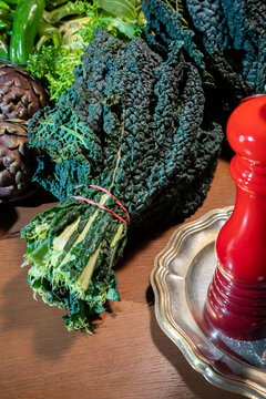 Fresh Cavolo Nero on Wooden Table