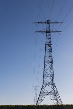 power lines in  flat landscape