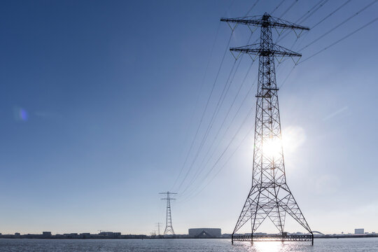 power lines in  flat landscape