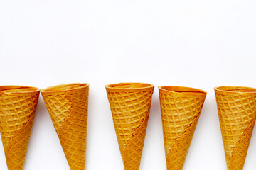 Waffle cones on white background