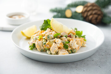 Traditional Russian salad with chicken fillet