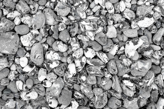 Black and white pebbles stone background
