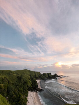 Tainted sky in soft pinks at golden hour, Lombok, Indonesia