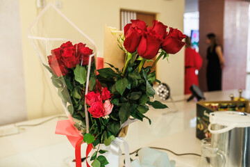 Wedding  beautiful bouquet of light several red and white color roses flowers