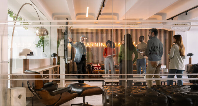 Collaborative business meeting in modern office environment