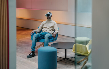 Person Relaxing in Modern Space with Virtual Reality Headset
