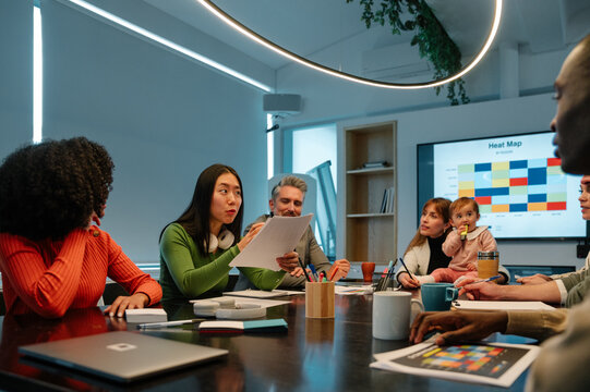 Diverse team working on a project in a modern office setting