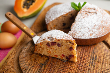 Delicious whole wheat vegan cake with papaya and nuts.